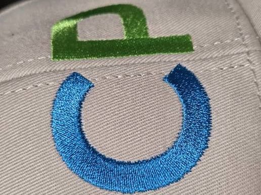 CP monogram cap embroidery digitizing in blue and green