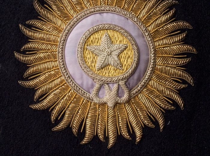 Bullion crest logo embroidery sample for leather and heavy garments