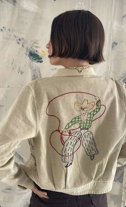 Cowboy rope scene jacket back embroidery digitizing on a denim jacket