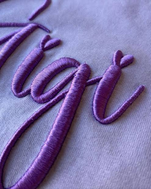 Purple script lettering 3D puff embroidery digitizing sample